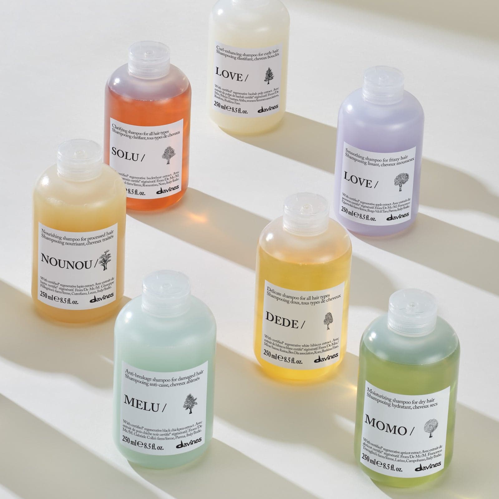 Davines shampoo bottles on a light surface